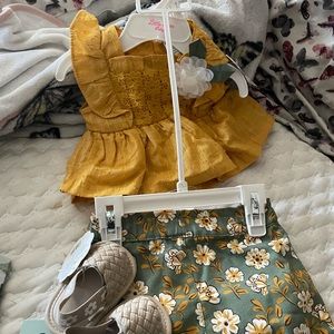 Greetings I’m selling a brand new with tags 0-6 baby boy and girl outfit